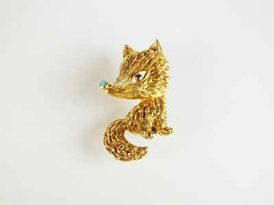 Lot 99 - An 18ct gold turquoise and sapphire novelty brooch in the form of a fox