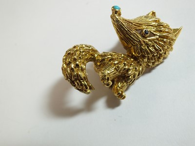 Lot 99 - An 18ct gold turquoise and sapphire novelty brooch in the form of a fox