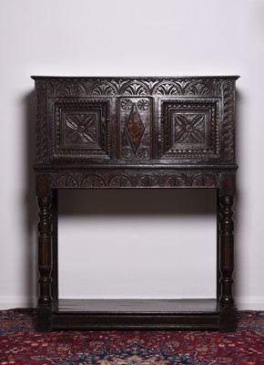 Lot 322 - A good Charles I oak livery cupboard