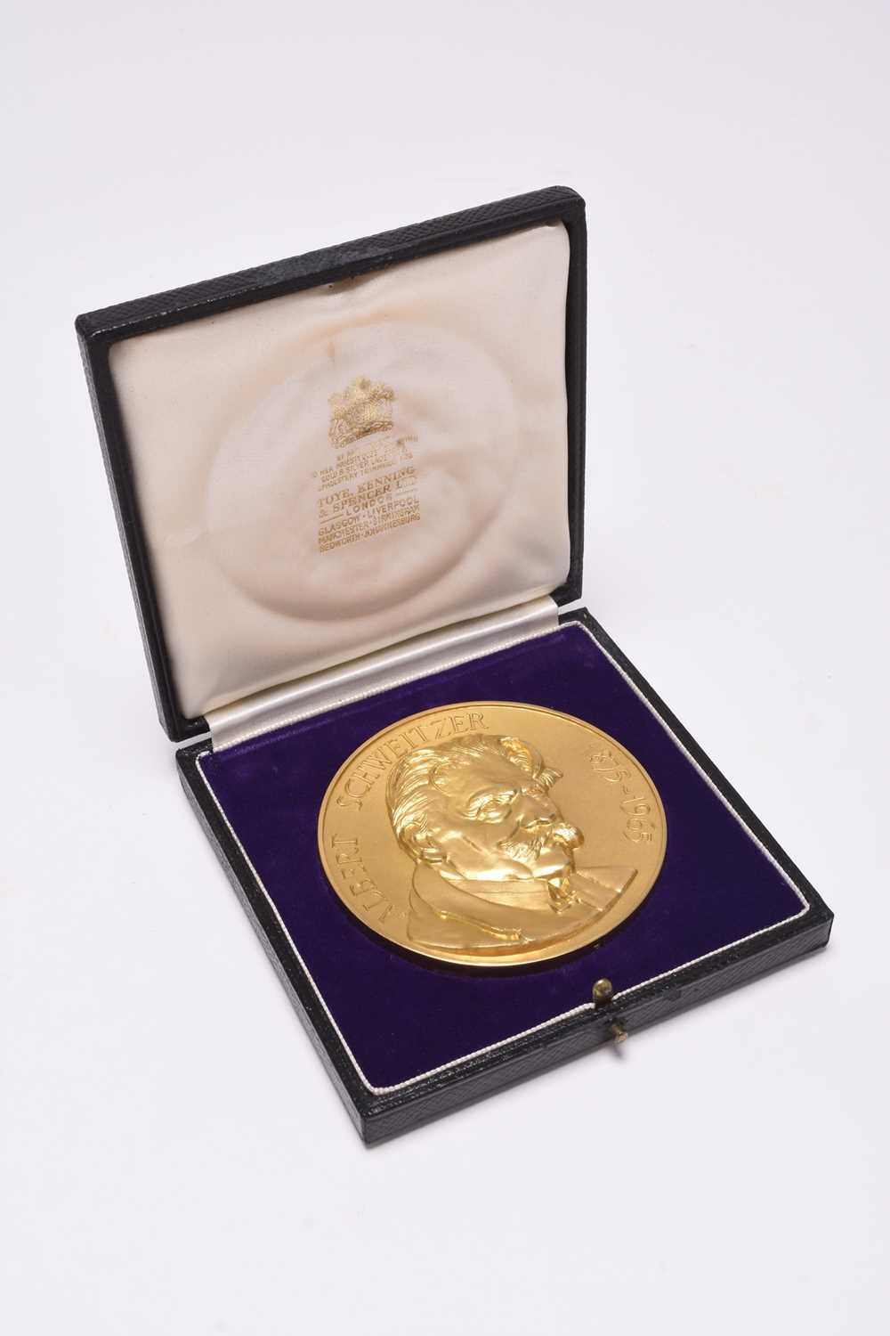 239 - A 22ct gold commemorative Albert Schweitzer Memorial Medallion 1875-1965