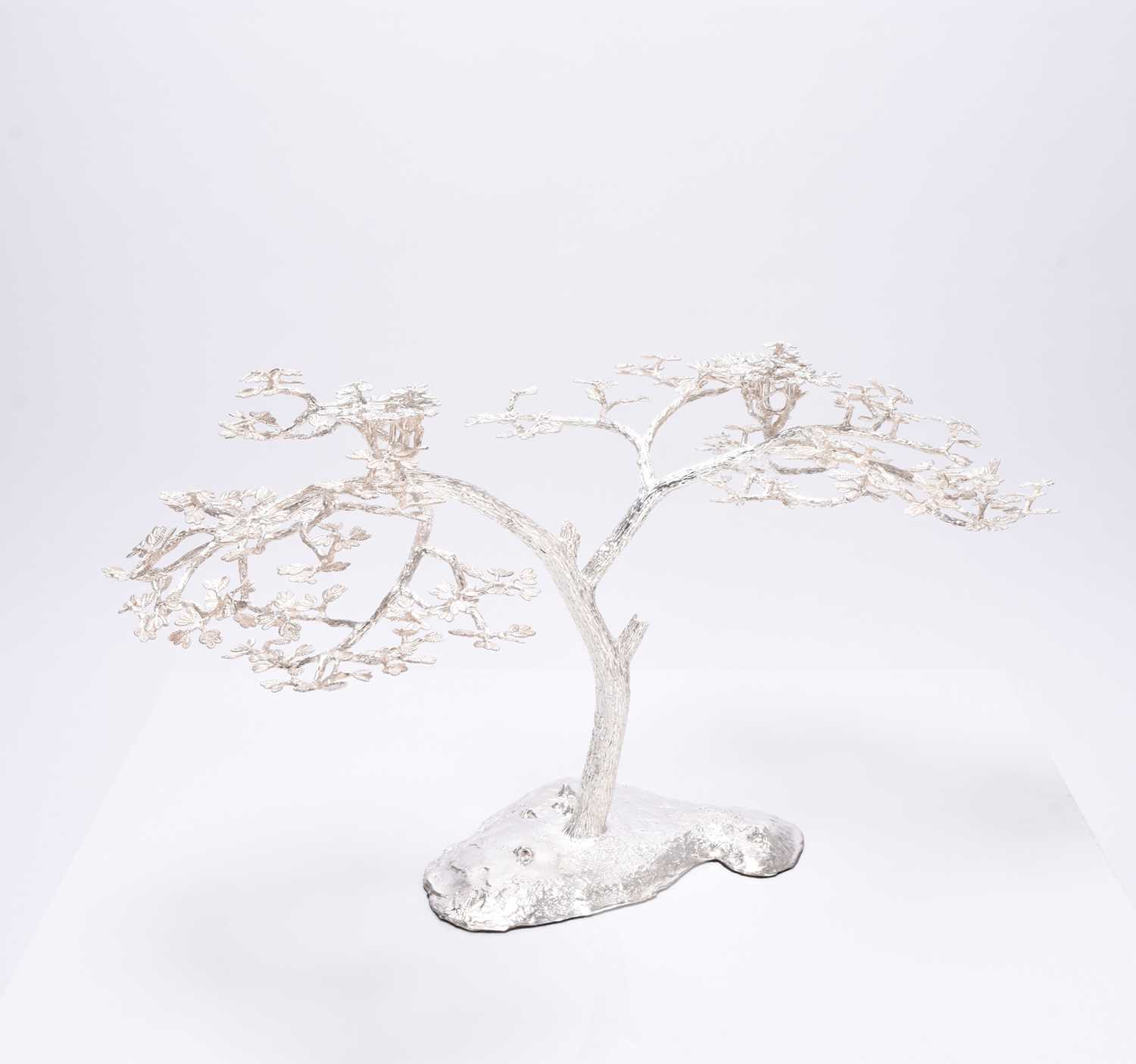 14 - A Patrick Mavros silver 'Fari' Acacia tree candle holder / table ornament