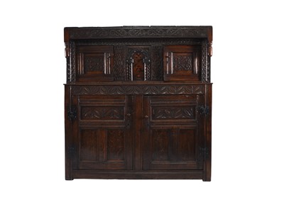 Lot 77 - A 17th century and later English oak court cupboard