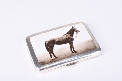 Lot 94 - An early 20th century silver and enamel cigarette case depicting a horse