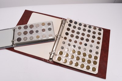 Lot 251 - Two coin albums containing UK and foreign silver, cupro-nickel, copper and bronze coinage