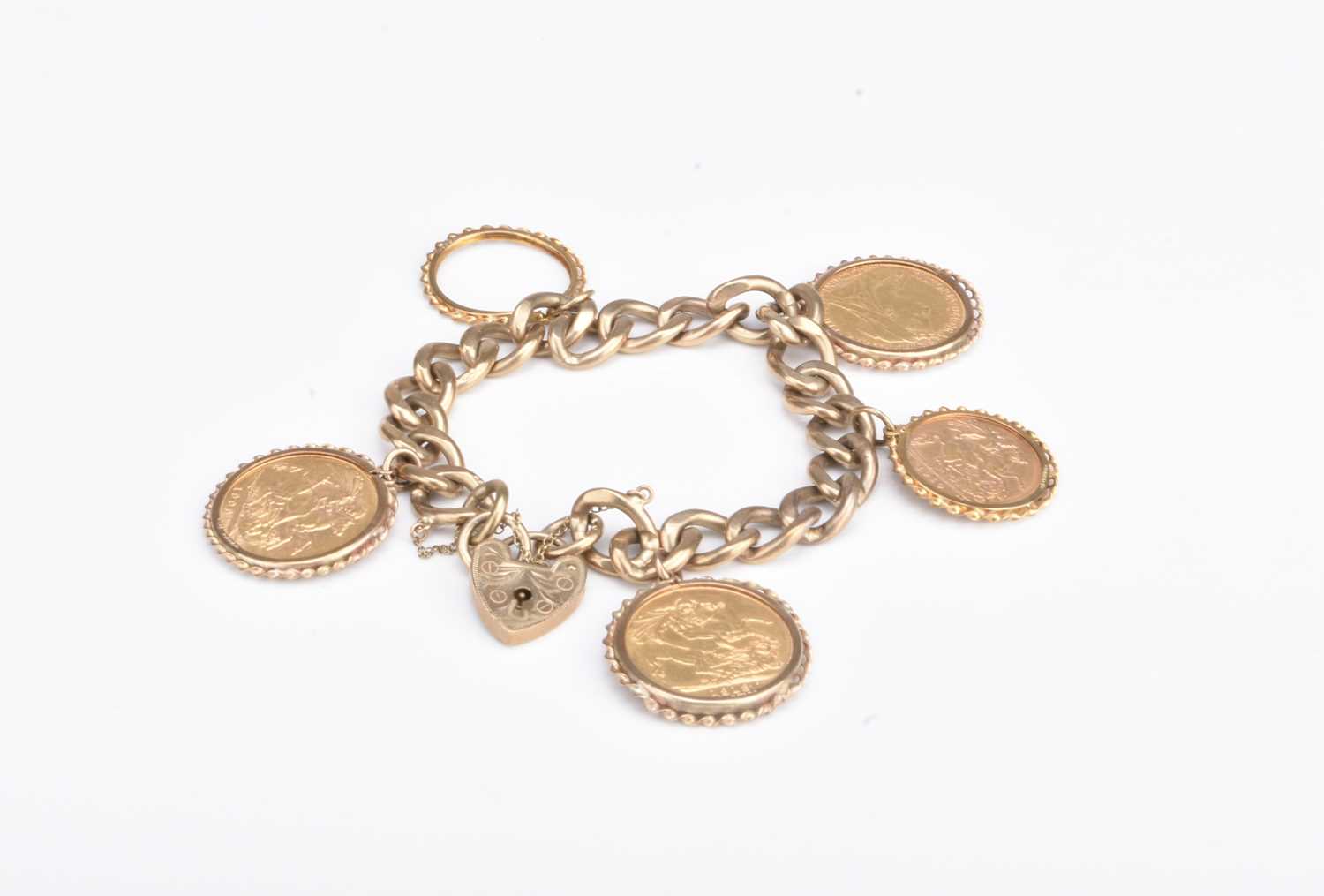 240 - A 9ct gold sovereign and half sovereign set bracelet
