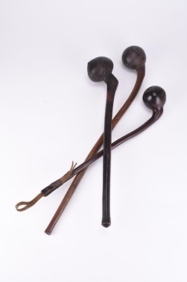 Lot 149 - Three African tribal Maasai hardwood throwing clubs