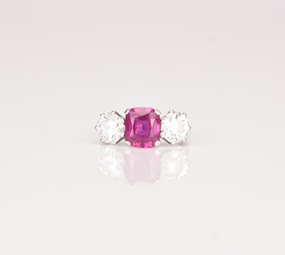 161 - A three stone ruby and diamond ring