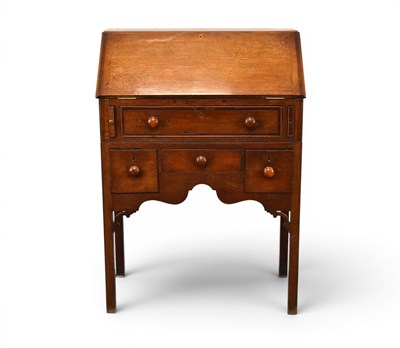Lot 286 - An 18th century oak bureau desk