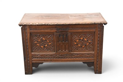 Lot 288 - A carved oak chest of small proportions