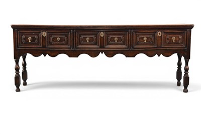 Lot 291 - A 17th century oak geometric fronted dresser base