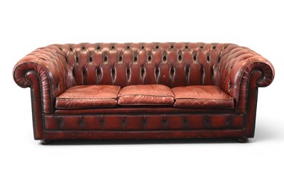 Lot 314 - A 20th century leather Chesterfield three-seater sofa