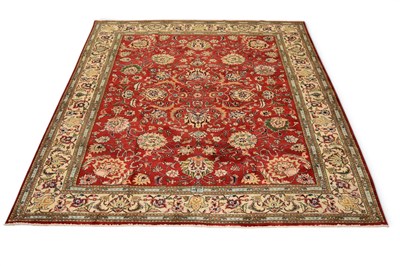 Lot 325 - A North West Persian Tabriz carpet, signed