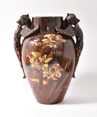 Lot 35 - A large and impressive Art Pottery vase with gryphon handles, late 19th/early 20th century