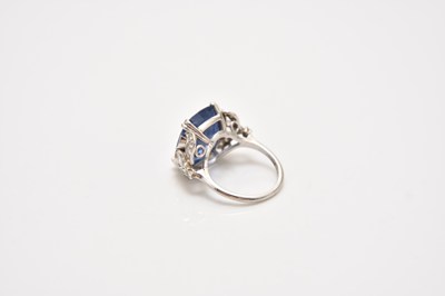 Lot 238 - A mid-20th century sapphire and diamond ring