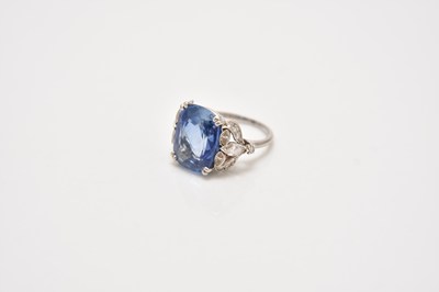 Lot 238 - A mid-20th century sapphire and diamond ring