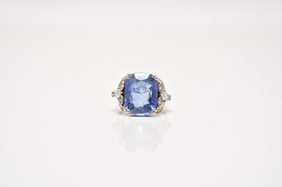 Lot 238 - A mid-20th century sapphire and diamond ring