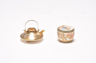 Lot 163 - A Japanese miniature water dropper and a miniature pot and cover