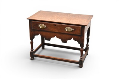 Lot 295 - An 18th century oak lowboy side table