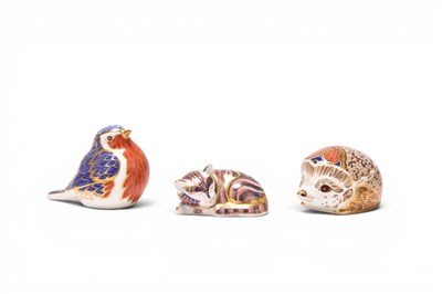 Lot 90 - Three Royal Crown Derby imari paperweights, gold stoppers