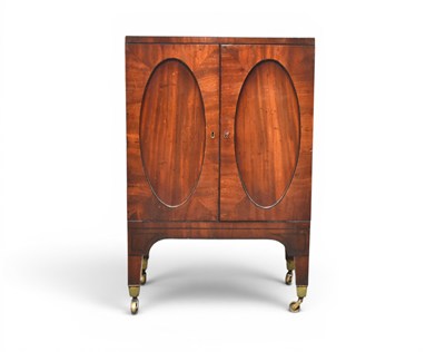 Lot 302 - A George III mahogany pot cupboard
