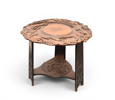 Lot 152 - A carved Art Nouveau style cricket table, manner of Liberty & Co