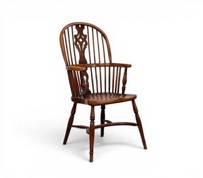 Lot 316 - A reproduction Windsor type armchair