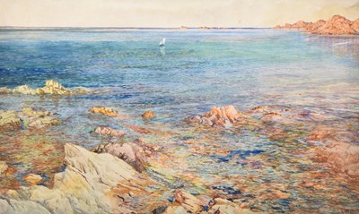 Lot 112 - William John Caparne (1856-1940) Summer Seas, a sailing boat off the rocky coast of Guernsey
